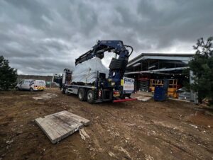 Unloading and installing x2 13tonne chiller/heat pumps with our fassi 660xp