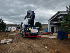 Unloading and installing x2 13tonne chiller/heat pumps with our fassi 660xp