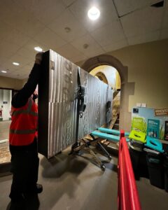 Moving this 400kg optical table down two flights of stairs in university listed building