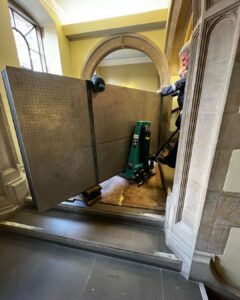 Moving this 400kg optical table down two flights of stairs in university listed building