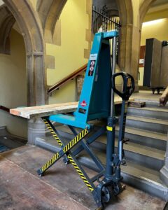 Moving this 400kg optical table down two flights of stairs in university listed building