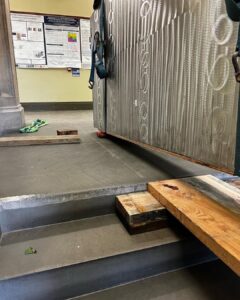 Moving this 400kg optical table down two flights of stairs in university listed building