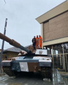 A 55tonne challenger tank being craned into position