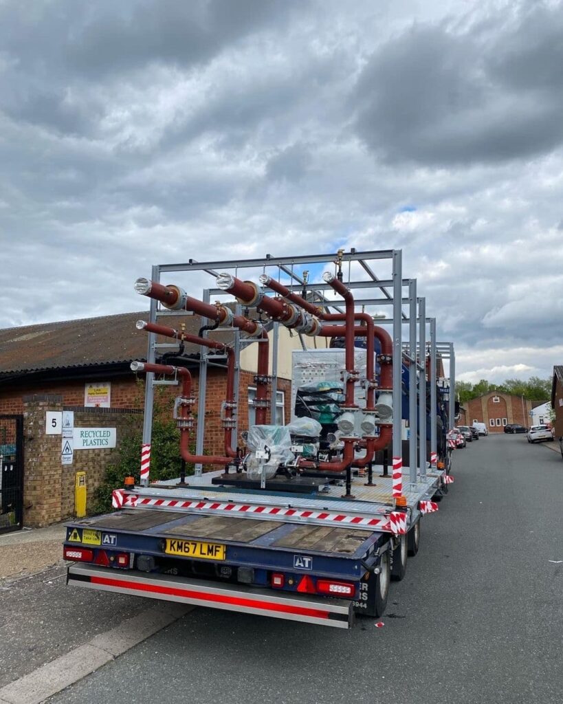 Plant and machinery transport collecting and delivering two pipe modules using our 660xp HIAB and drawbar trailer