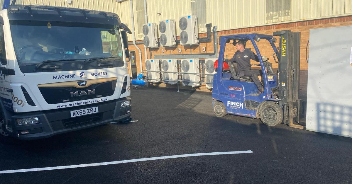 Factory relocation of dry cleaning machinery.